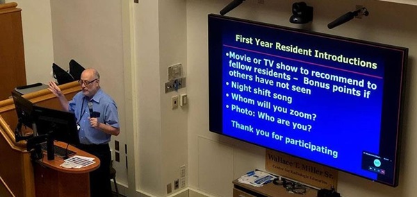 Dr. Evan Siegelman giving Resident Introductions lecture in Donner, Summer 2021